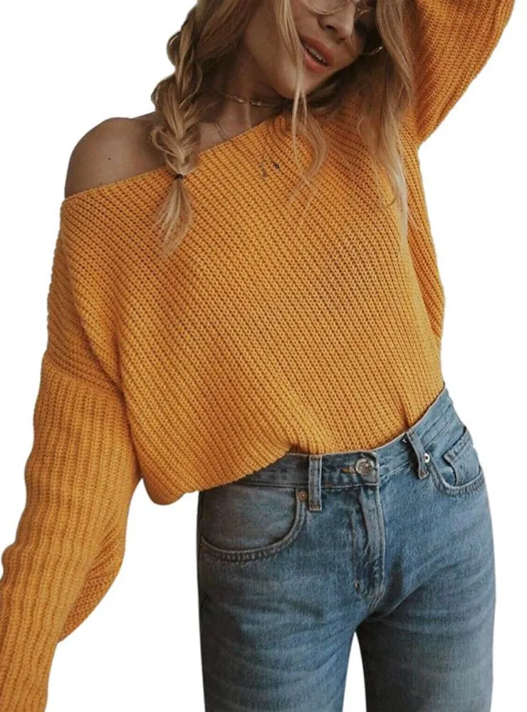 A LONG SLEEVED PULLOVER OPEN NECK SHOULDER