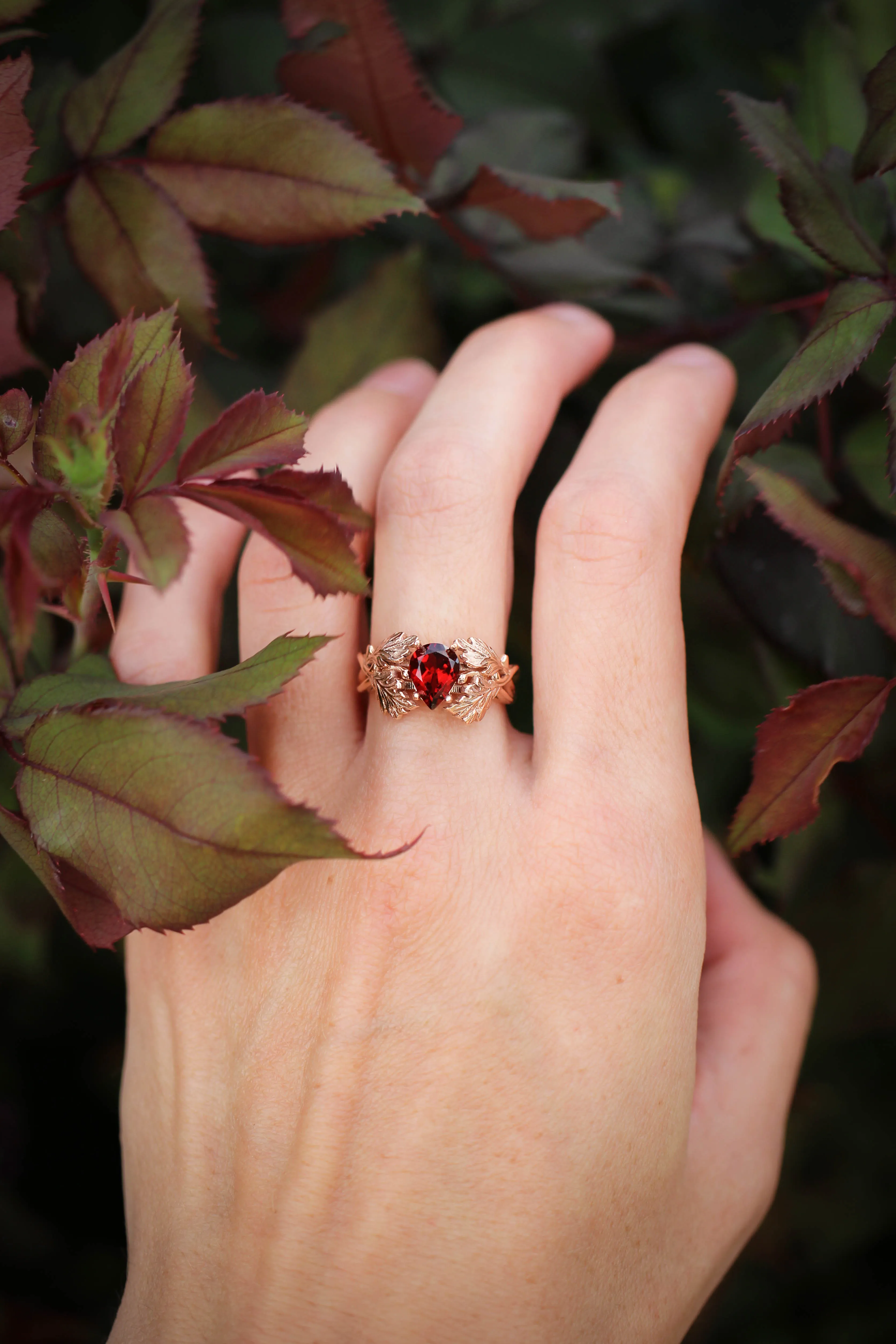 Maple leaves ring with pear cut garnet