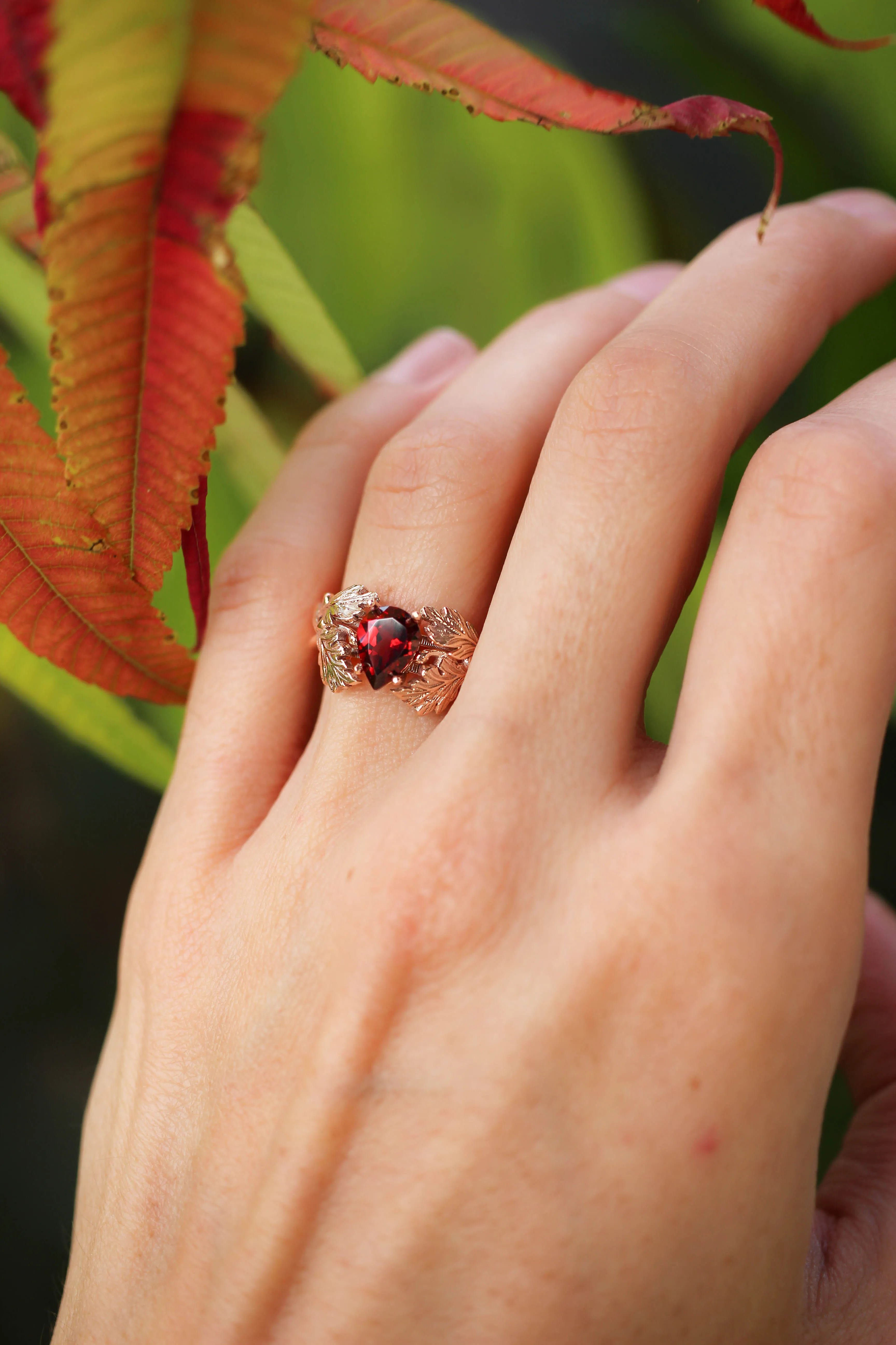 Maple leaves ring with pear cut garnet