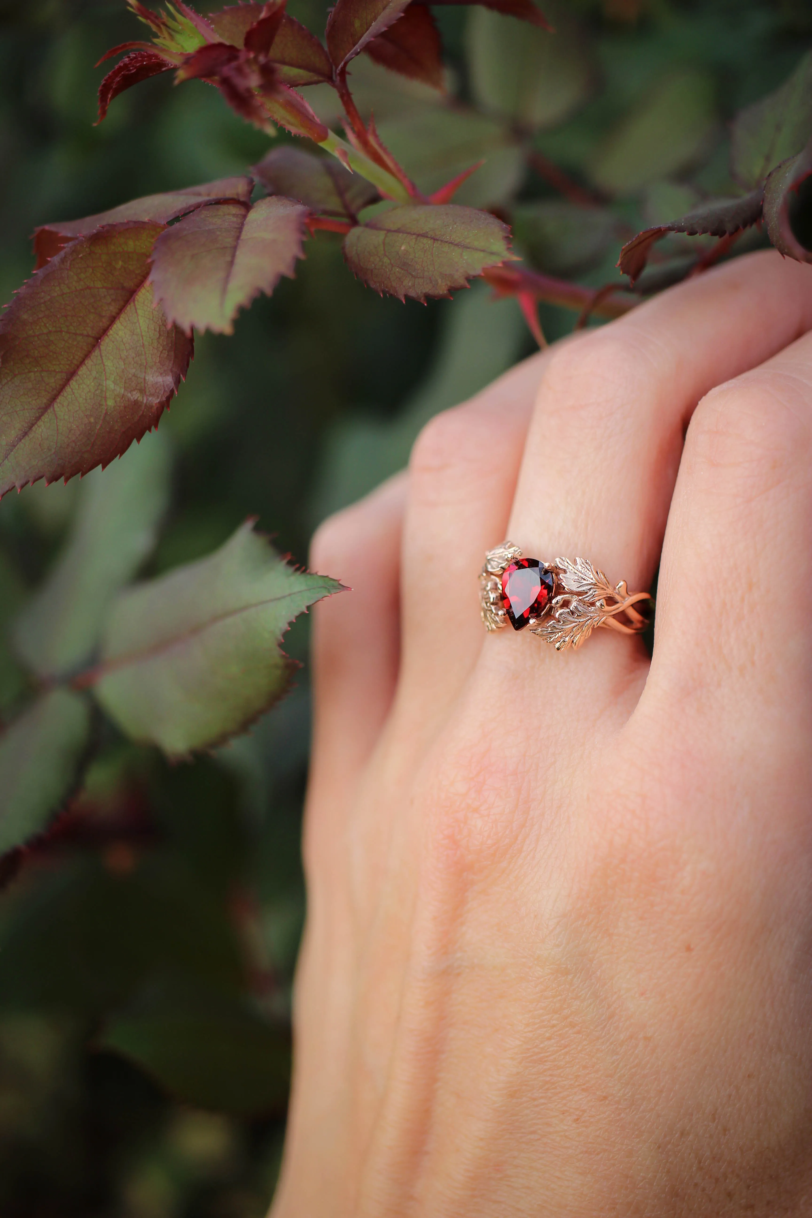 Maple leaves ring with pear cut garnet