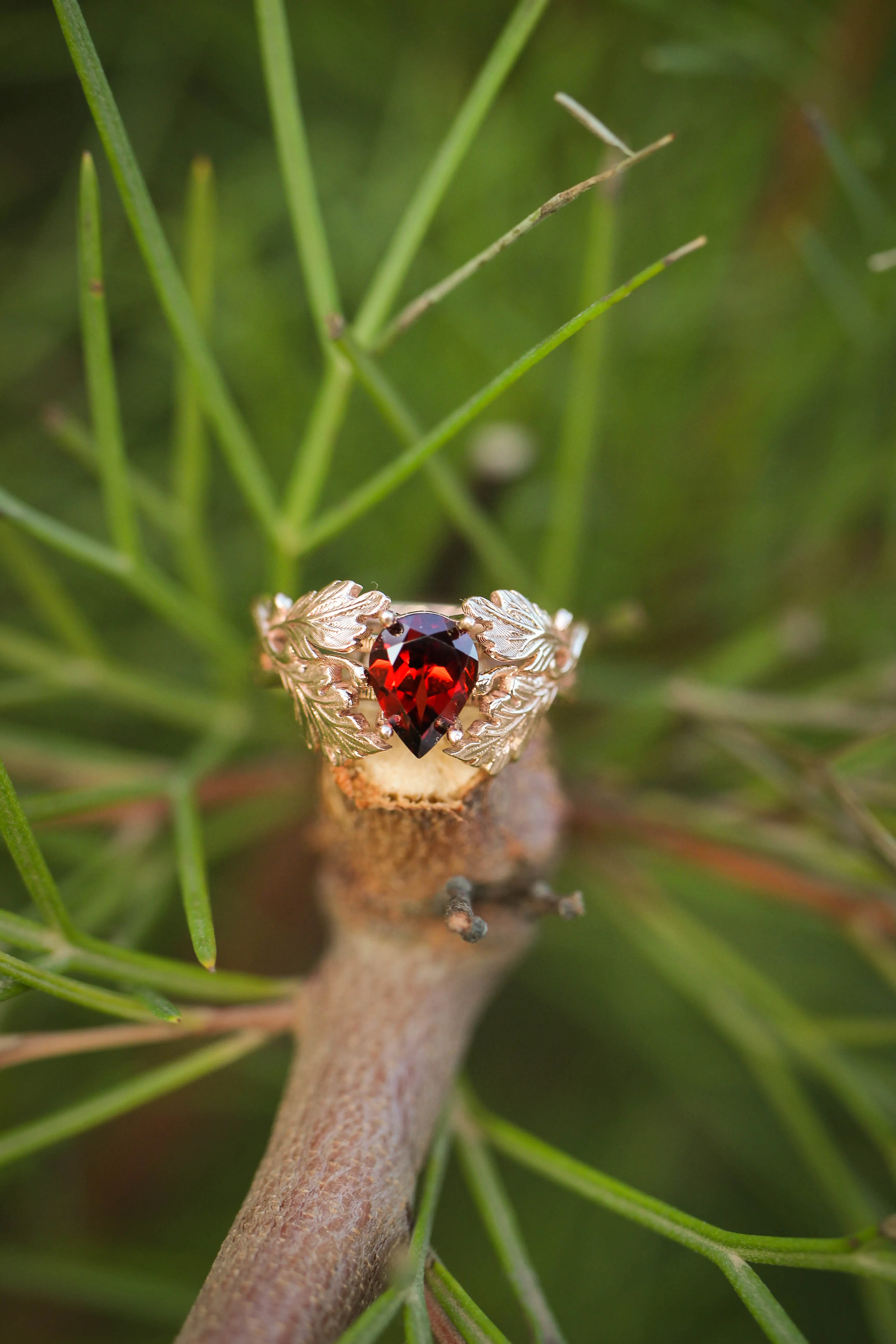 Maple leaves ring with pear cut garnet