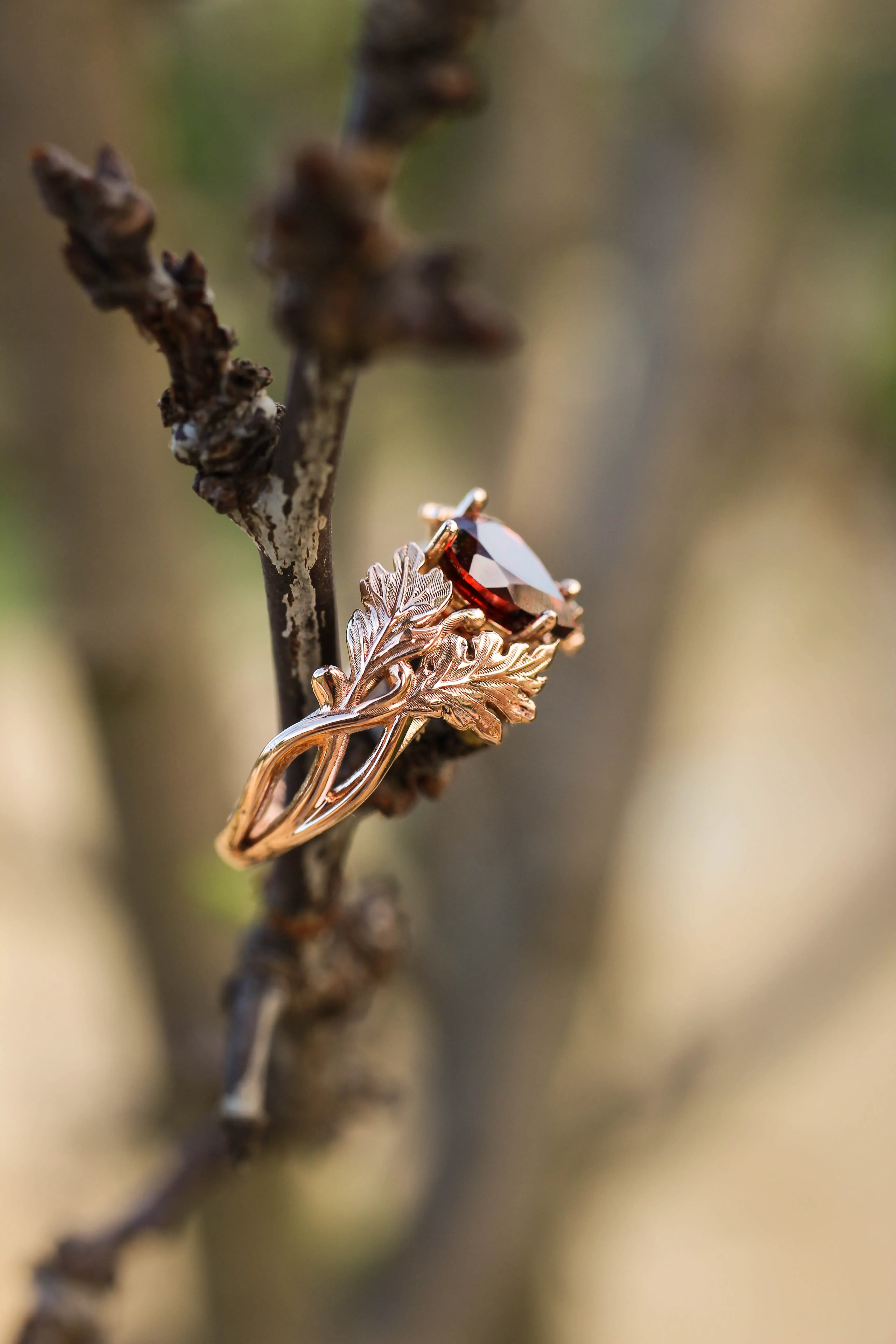 Maple leaves ring with pear cut garnet