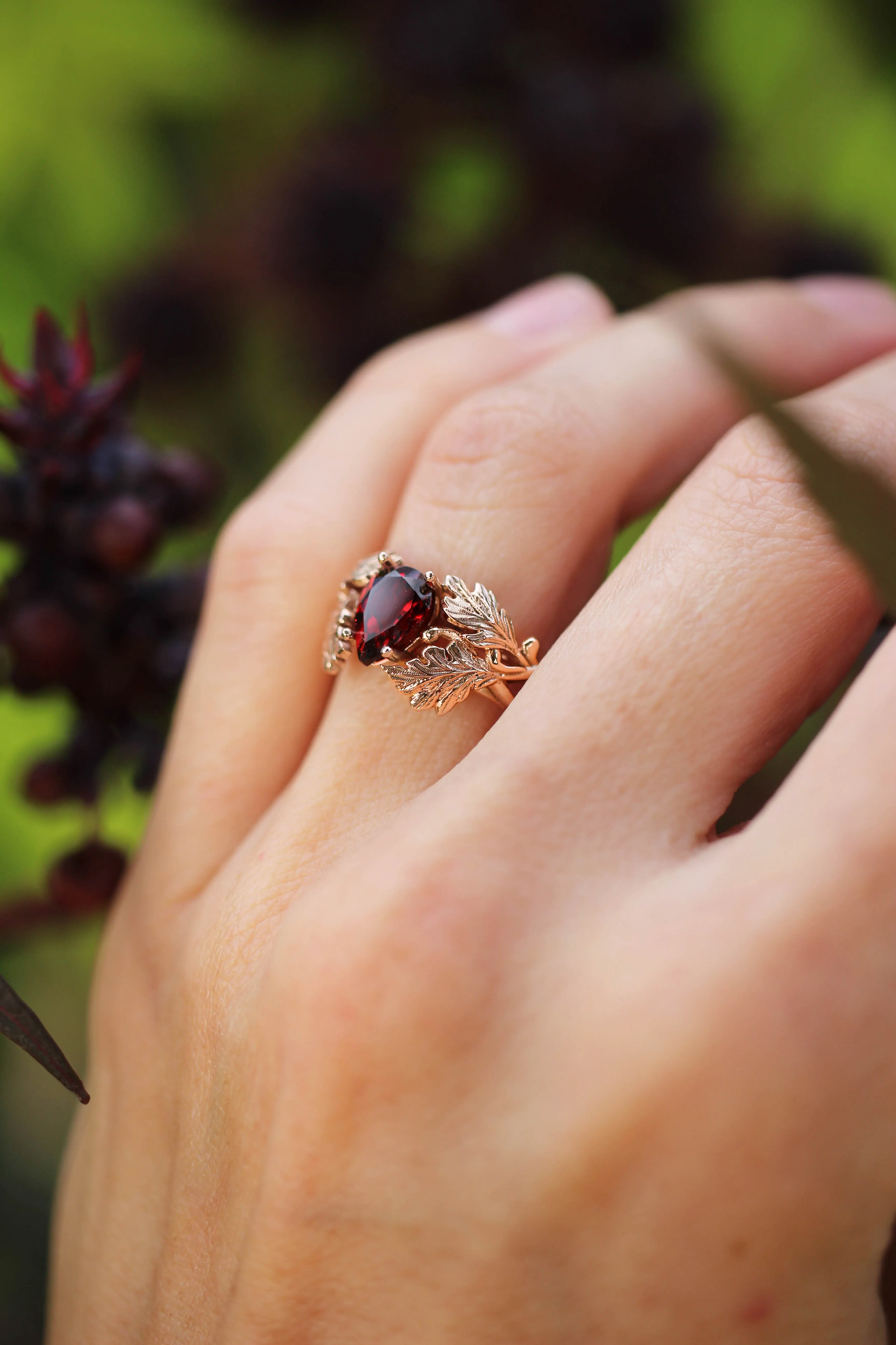 Maple leaves ring with pear cut garnet