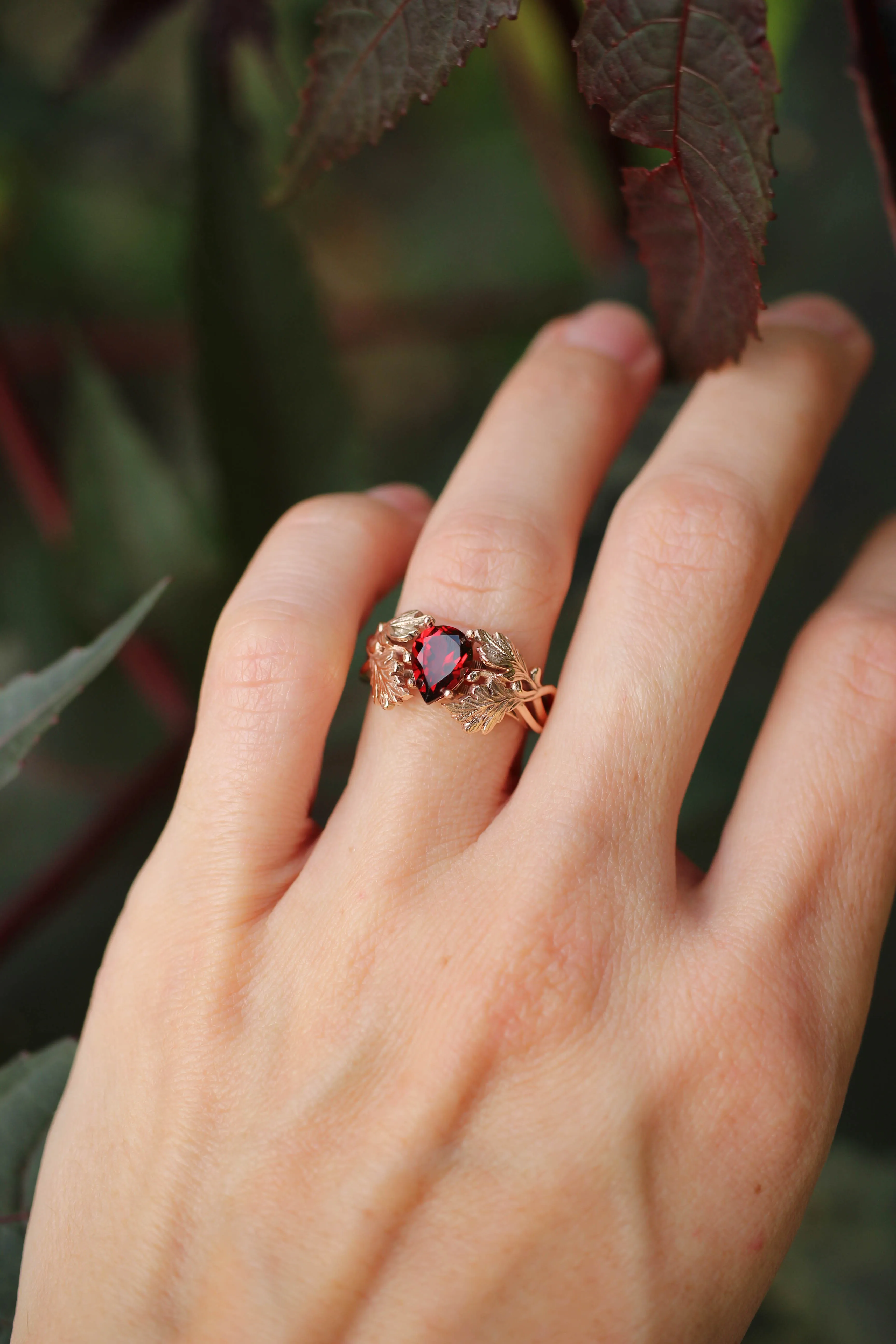 Maple leaves ring with pear cut garnet